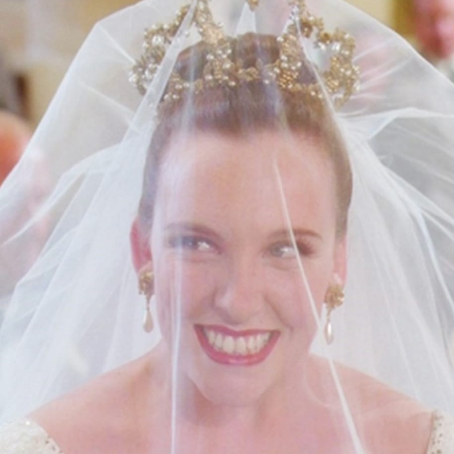 Close up shot of Muriel's face on her wedding day
